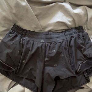 size 8 hotty hot shorts 2.5 inseam with black logo embedded design!